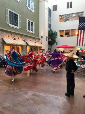 Performers dancing at an event.
