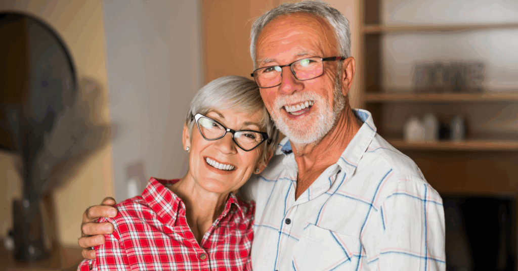 a senior couple smiling