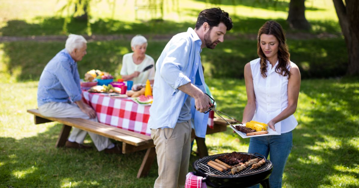 a family sharing a meal outside